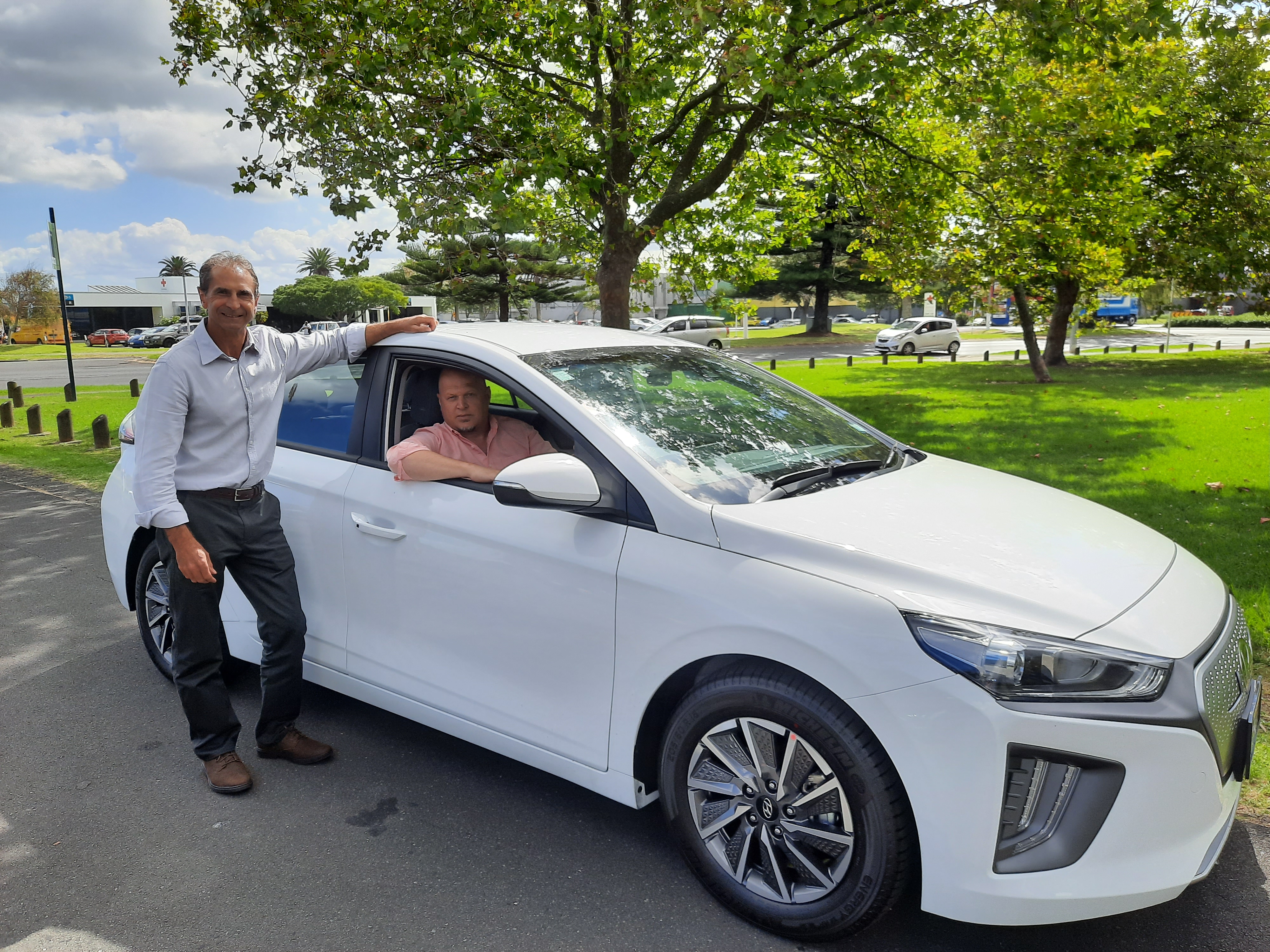 Left to right: Andrew Czar, Team Lead Workplace Services North, and Kevin Meadows, Domain Lead Workplace Services, in one of the new EVs in Manukau.